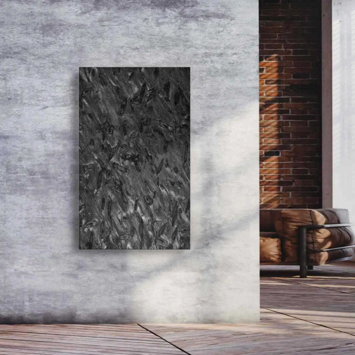 Designradiator Matrix in donkere leisteen aan een betonnen wand in een woonruimte