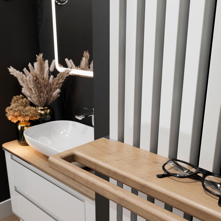 Detail van de bovenzijde van de witte designradiator Triga